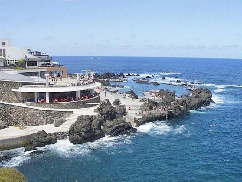 Discover Madeira: Full-Day Tour to Porto Moniz - What the guide and transport add