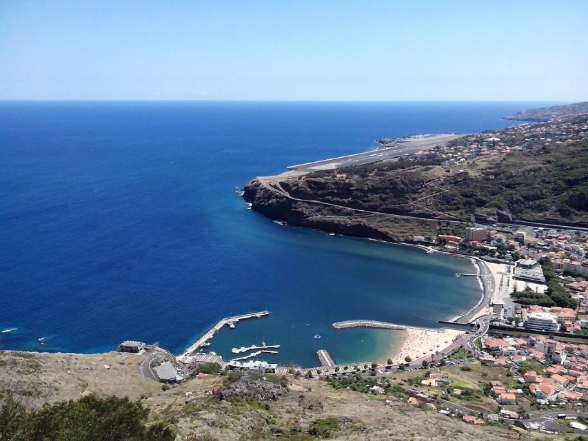 Eastern Madeira: Full-Day Tour with Rum Tasting - Guindaste skywalk and the view toward Porto Santo