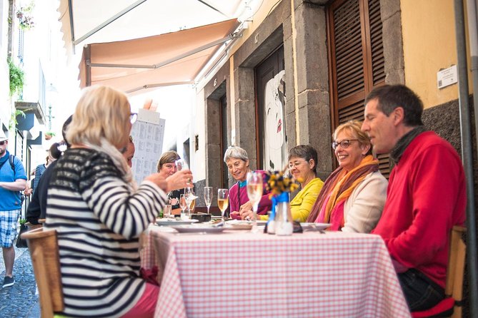 Eating Madeira! Wine & Food Tour in Funchal - The city walk between each tasting