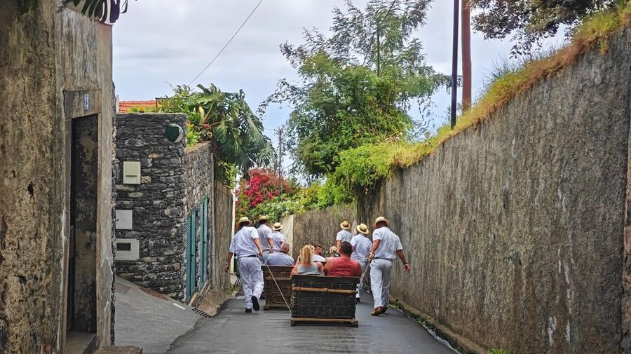 Funchal: Monte Toboggan and Old Town Tour by Tuk-Tuk - Buying the ticket and waiting for the sled