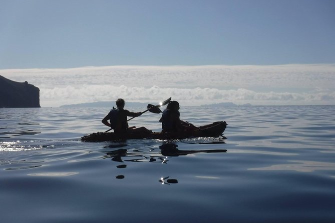 Half day kayak tours - A pebble beach and old rock formations