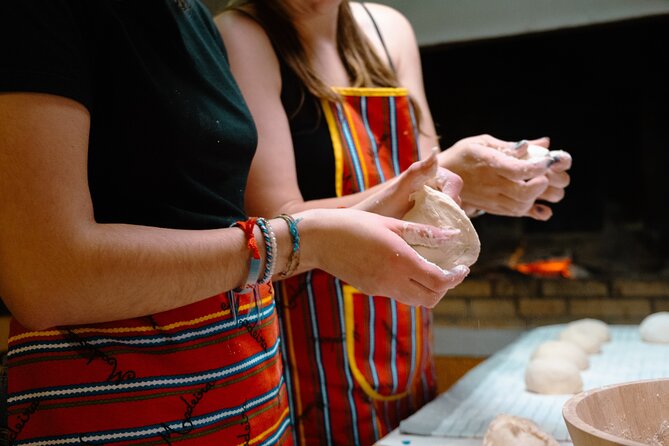 Hands-On Bolo do Caco Baking Class with a Madeiran Family - Watching the Bread Cook on Hot Stone